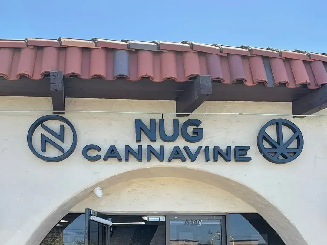 Nug Cannavine building with red tile roof and arched entrance